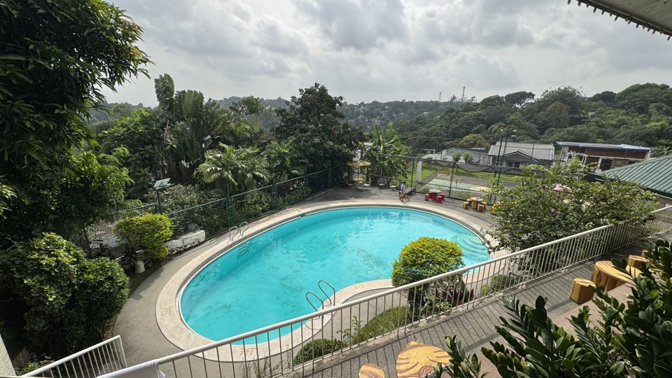 The swimming pool and gardens of Summerhills Executive Village, Antipolo